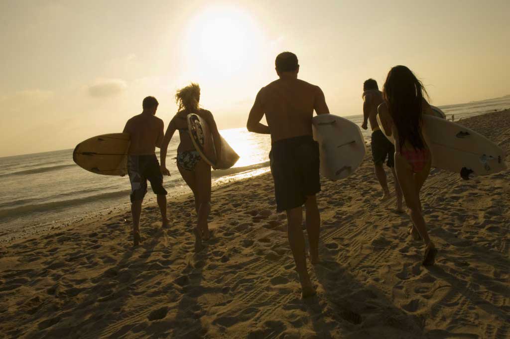 Canadian Family going Surfing at Beach