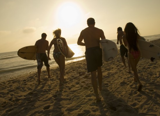 Canadian Family going Surfing at Beach